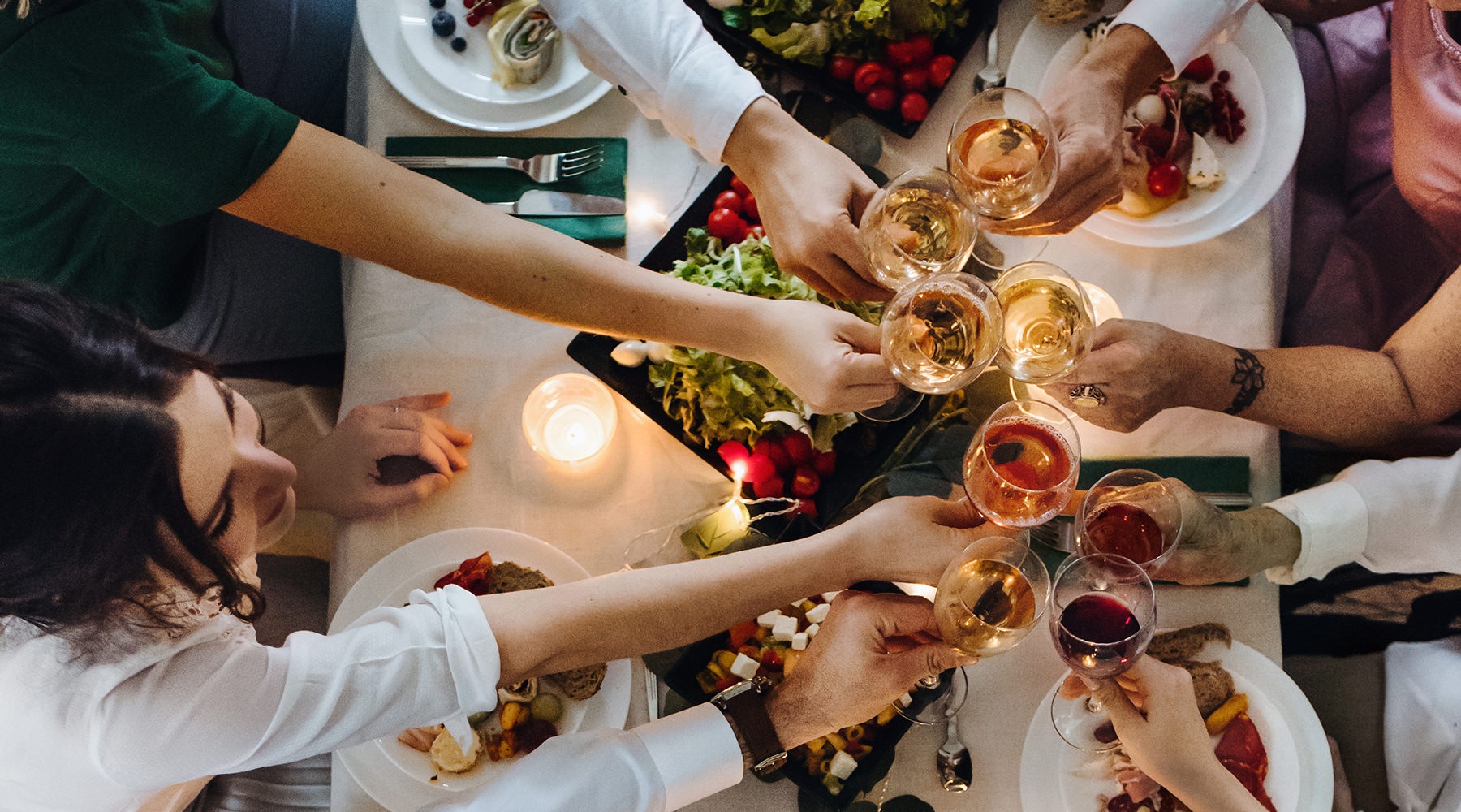 friends have a cheers with wine