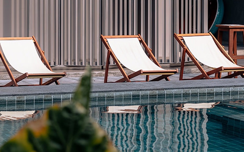 lounge chairs by a pool